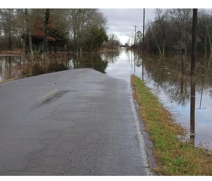 street in alabama flooded on both sides