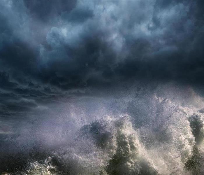 storm clouds above a raging sea